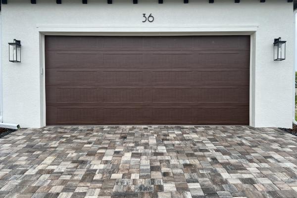 C.H.I. Model 5951 Stamped Carriage Long Panel In Classic WoodTone Color Installed By ABS Garage Doors in Flagler Beach, Florida