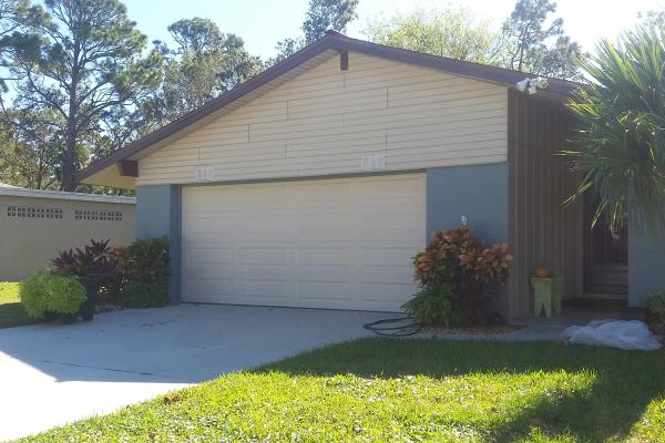 Raised Long Panel Garage Door in Almond