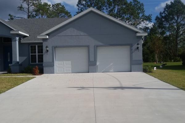 Single car raised short panel garage doors