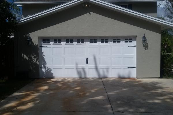 Carriage Stamp Short Panel Garage Door with Stockton Glass Top Section and Spade Hardware 